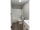 Simple bathroom with a tub shower combo and updated toilet and vanity at 106 Gilliatt St, Shelby, NC 28150