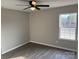Cozy bedroom with hardwood floors and a large window at 106 Gilliatt St, Shelby, NC 28150