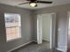 Well-lit bedroom with hardwood floors and built-in closet at 106 Gilliatt St, Shelby, NC 28150