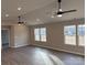 Bright living room featuring hardwood floors and a vaulted ceiling at 106 Gilliatt St, Shelby, NC 28150