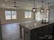 Spacious living area with LVP flooring, high ceilings, and plenty of natural light at 106 Gilliatt St, Shelby, NC 28150