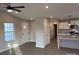 Open floor plan with LVP flooring, recessed lighting, and access to the kitchen at 106 Gilliatt St, Shelby, NC 28150