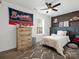 Sports-themed bedroom featuring dark trim, brick wall, and lots of natural light at 1133 Hidden Brook Ln, Clover, SC 29710