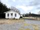 White house exterior with steps and carport at 115 Hillcrest Dr, Bessemer City, NC 28016