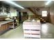 Spacious workshop with built-in shelving and workbenches at 115 Hillcrest Dr, Bessemer City, NC 28016