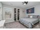 Bedroom with a bed and built-in shelving at 1203 Janrose Nw Ct, Concord, NC 28027