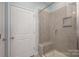 Walk-in shower with tiled walls and built-in bench seat at 1206 Croft Dr # 98, Fort Mill, SC 29708