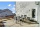 Cozy back patio with table and chairs, ideal for outdoor enjoyment at 128 Shay Crossing Rd, Salisbury, NC 28146