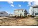 Spacious backyard featuring well-maintained landscaping and a cozy seating area at 128 Shay Crossing Rd, Salisbury, NC 28146