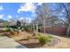 Landscaped backyard with a fire pit area, perfect for relaxation and outdoor enjoyment at 128 Shay Crossing Rd, Salisbury, NC 28146