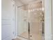 Contemporary bathroom featuring a glass-enclosed shower with built-in shelves at 128 Shay Crossing Rd, Salisbury, NC 28146