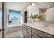 Bright bathroom with double vanity, soaking tub, and large window with a view at 128 Shay Crossing Rd, Salisbury, NC 28146