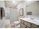 Well-lit bathroom featuring a stylish shower curtain and sink at 128 Shay Crossing Rd, Salisbury, NC 28146