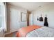 Cozy bedroom with stylish hangers and a view from the window at 128 Shay Crossing Rd, Salisbury, NC 28146