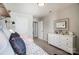 Well-lit bedroom featuring a stylish dresser and comfortable sleeping space at 128 Shay Crossing Rd, Salisbury, NC 28146