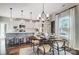Bright dining area adjacent to kitchen with stylish decor at 128 Shay Crossing Rd, Salisbury, NC 28146