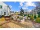 Relaxing fire pit area with two Adirondack chairs, ideal for outdoor gatherings at 128 Shay Crossing Rd, Salisbury, NC 28146
