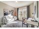 Bright home office with a comfortable couch and a work desk at 128 Shay Crossing Rd, Salisbury, NC 28146