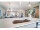 Modern kitchen with a large island and stainless steel sink at 128 Shay Crossing Rd, Salisbury, NC 28146