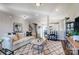 Bright and inviting living room featuring neutral decor, stylish furnishings, and dark wood flooring at 128 Shay Crossing Rd, Salisbury, NC 28146