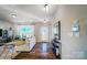 Bright living room with hardwood floors and open concept floor plan at 128 Shay Crossing Rd, Salisbury, NC 28146