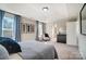 Relaxing main bedroom featuring a tray ceiling, natural light, and comfy seating at 128 Shay Crossing Rd, Salisbury, NC 28146