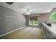 Loft featuring neutral walls, carpet, and unique window treatments at 128 Steinbeck Way # E, Mooresville, NC 28117