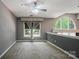 Loft area featuring arched windows and neutral decor at 128 Steinbeck Way # E, Mooresville, NC 28117