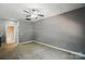 Loft space with access to bathroom, neutral walls, and carpet at 128 Steinbeck Way # E, Mooresville, NC 28117