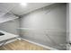 Walk-in closet with installed shelving and carpeted floors at 128 Steinbeck Way # E, Mooresville, NC 28117