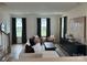Bright living room with large windows, neutral color palette, and stylish furniture at 14016 Felix Ln # 6, Charlotte, NC 28277