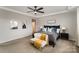 Main bedroom with king bed and stylish decor at 15421 Keyes Meadow Way, Huntersville, NC 28078