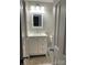Clean bathroom with white vanity, modern fixtures, and a toilet at 16721 Spinnaker Ln, Cornelius, NC 28031