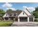 Craftsman style home with gray siding, stone accents, and a two-car garage at 188 Heartland Dr # 23, Rock Hill, SC 29732