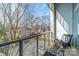 Enjoy the beautiful views from this balcony, perfect for relaxing and entertaining with comfortable seating and natural light at 2116 Mcclintock Rd, Charlotte, NC 28205