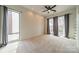 Bright bedroom with natural light, ceiling fan, neutral carpeting and modern design at 2116 Mcclintock Rd, Charlotte, NC 28205