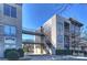 Contemporary condo building featuring walkways, modern design, and manicured landscaping at 2116 Mcclintock Rd, Charlotte, NC 28205