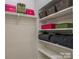 Walk-in closet boasts built-in shelving, offering ample storage space for clothes and accessories at 2116 Mcclintock Rd, Charlotte, NC 28205