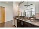 Stylish kitchen features stainless appliances, granite countertops, and view to adjacent living room at 2116 Mcclintock Rd, Charlotte, NC 28205