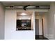 A modern kitchen with dark wood cabinets, stainless appliances, and a functional design is presented at 2116 Mcclintock Rd, Charlotte, NC 28205