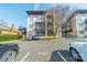 View of building exterior and parking lot with assigned parking space clearly marked at 2116 Mcclintock Rd, Charlotte, NC 28205