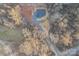 Overhead shot of home, long drive and private lot surrounded by mature trees at 252 Big Lick Rd, Stanfield, NC 28163