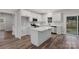 A bright kitchen with modern stainless steel appliances and island at 252 Big Lick Rd, Stanfield, NC 28163