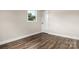 Simple bedroom featuring wood-look floors and a closet at 2525 Oxford Cir, Lancaster, SC 29720