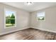 Well-lit bedroom with hardwood floors and neutral wall colors at 2525 Oxford Cir, Lancaster, SC 29720