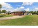 Front view of charming brick ranch house with yard at 2525 Oxford Cir, Lancaster, SC 29720