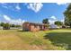 Side view of brick ranch house with large yard at 2525 Oxford Cir, Lancaster, SC 29720