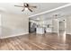 Modern kitchen with white cabinets, granite countertops, and stainless steel appliances at 2525 Oxford Cir, Lancaster, SC 29720