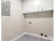 Laundry room with upper cabinets and space for a washer and dryer at 2525 Oxford Cir, Lancaster, SC 29720