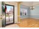 Bright and airy entryway with hardwood floors and neutral walls at 2534 Old Ashworth Nw Ln, Concord, NC 28027